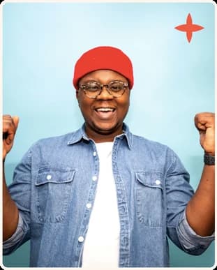 A person in a red beanie cheering