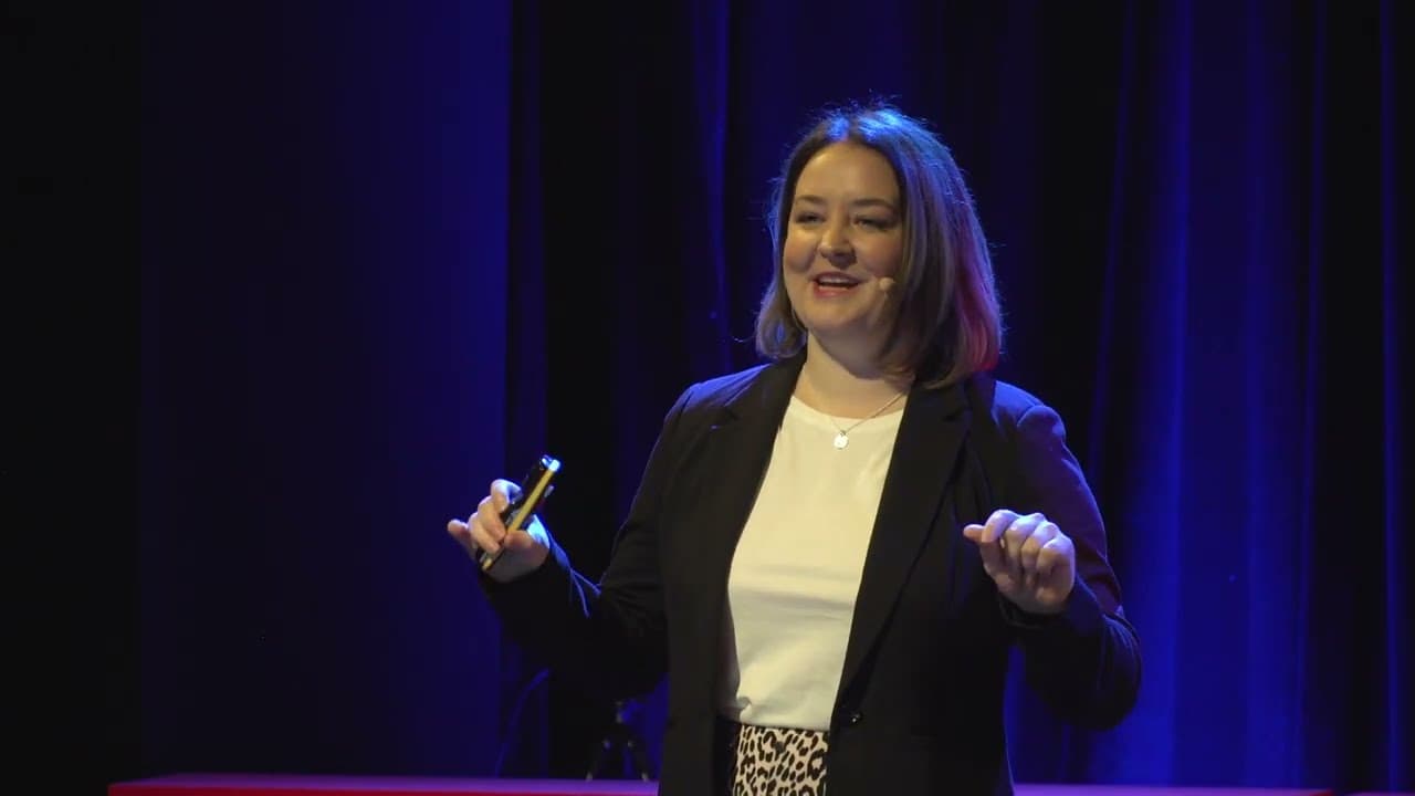 Holly McLoughlin on the TEDx stage